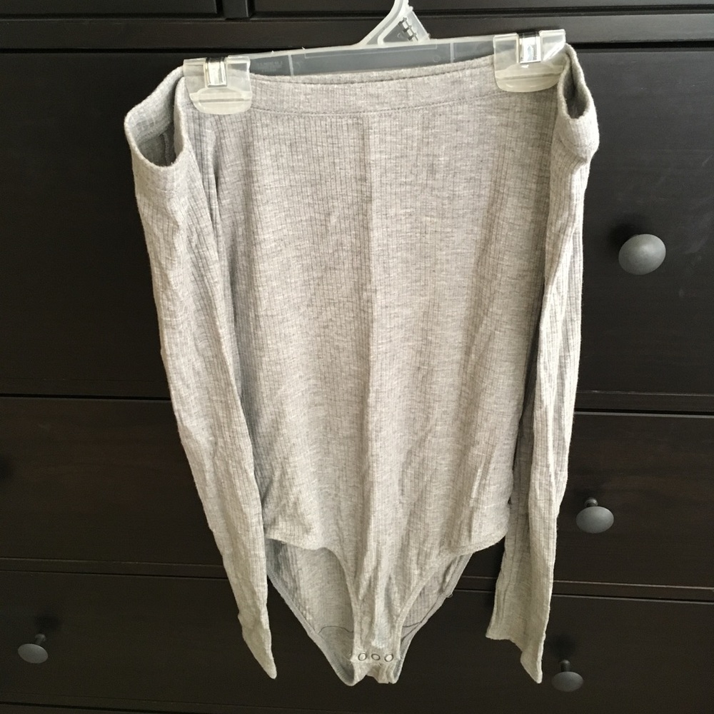 Off shoulder body suit.